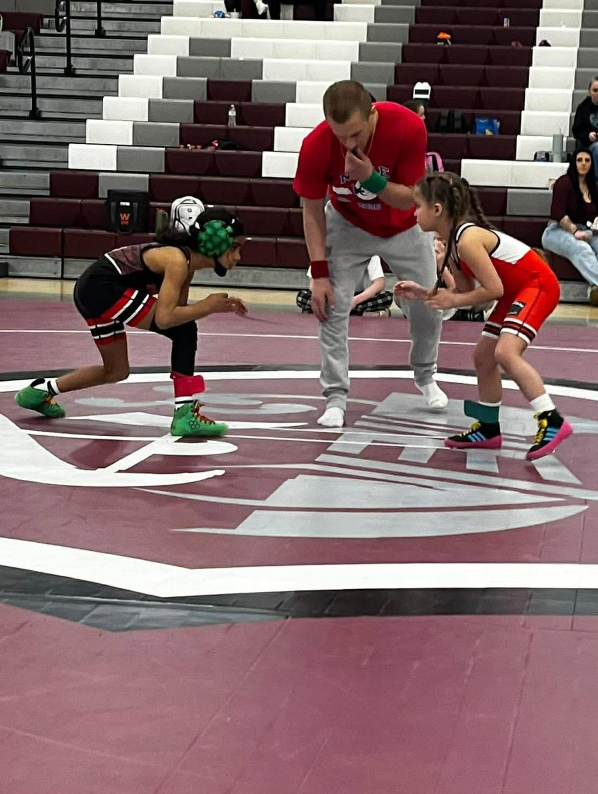 Youth wrestlers preparing for practice