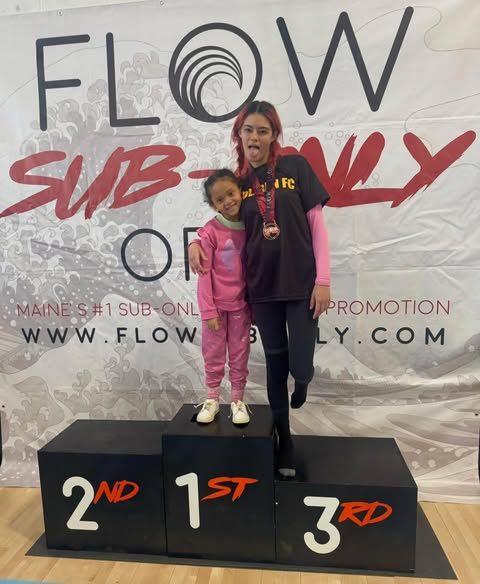 Youth wrestler on podium